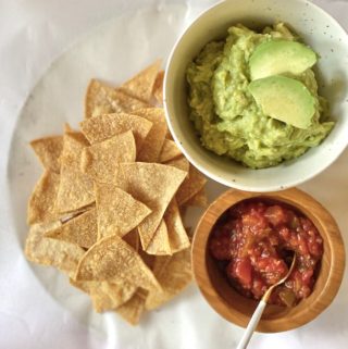 Baked Corn Tortilla chips with guacamole and salsa
