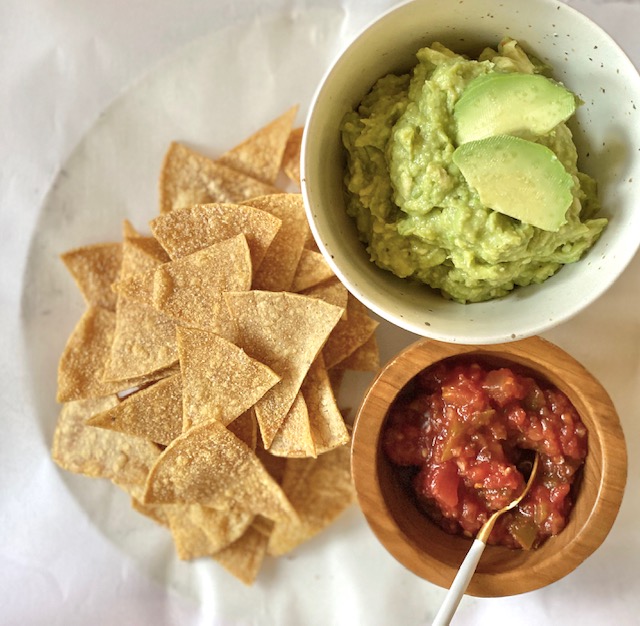 Baked Corn Tortilla chips with guacamole and salsa