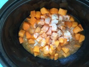 butternut squash soup ingredients in a slow cooker