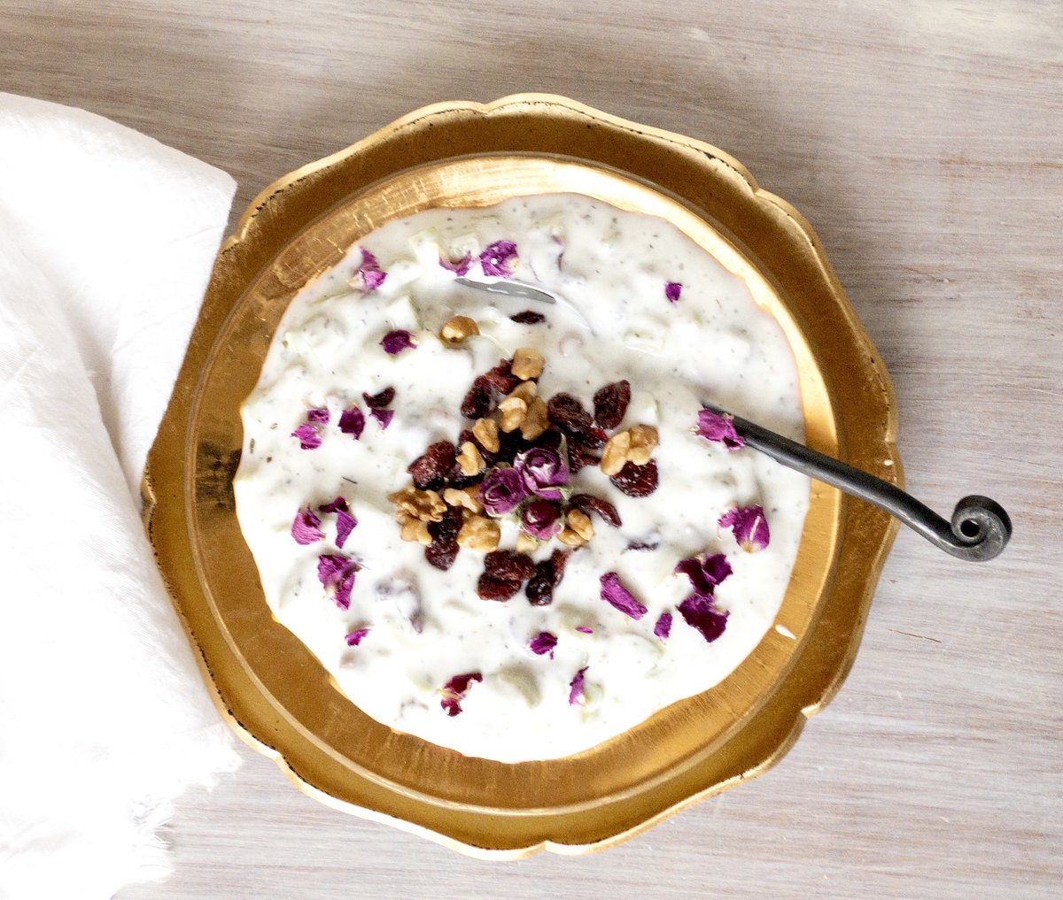 Persian yogurt dip variation with walnuts and cranberries.