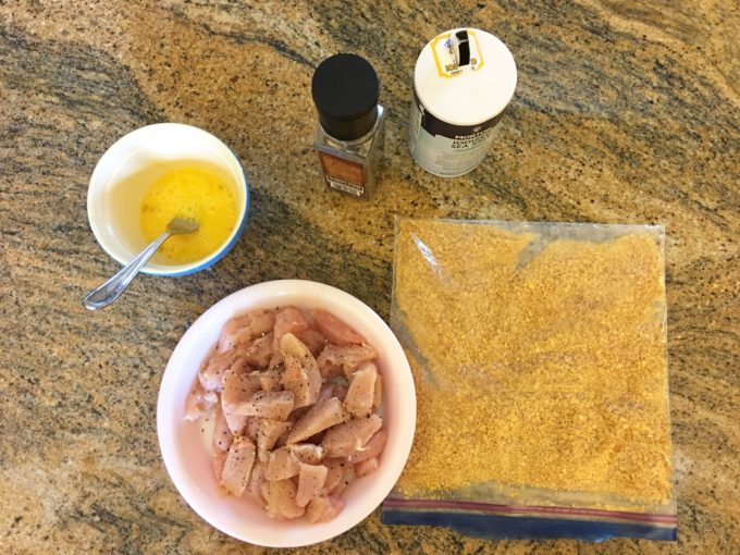 ingredients for baked cornflake crusted chicken nuggets chicken tenders