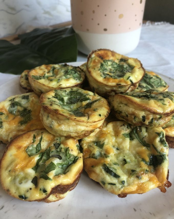 Zucchini frittatas with added arugula greens and cheddar cheese