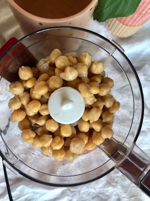 Garbanzo beans also known as chickpeas in a cuisinart blender