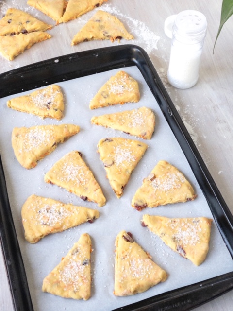 placement of carrot tahini scones on a baking sheet lined with parchment paper