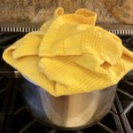 wrapping dish towel or damkoni to lock in steam while cooking
