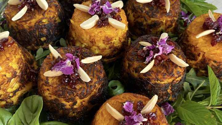 https://ovenhug.com/wp-content/uploads/2021/04/Persian-Crispy-Rice-Cups-Tahchin-topped-with-Candied-Zereshk-720x405.jpg