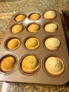 Baked Yazdi cupcakes in a muffin tin