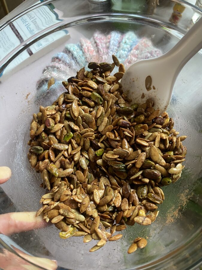 nuts and seeds with pumpkin pie spices and maple syrup